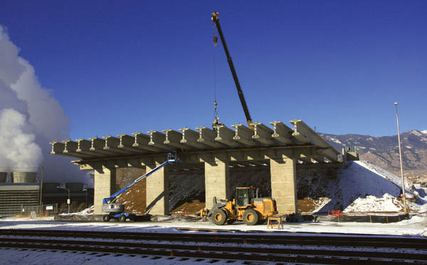 The new Cimarron bridge over Conejos Street and the railroad tracks has begun taking shape, as new concrete 
girders have been installed.
Westside Pioneer photo