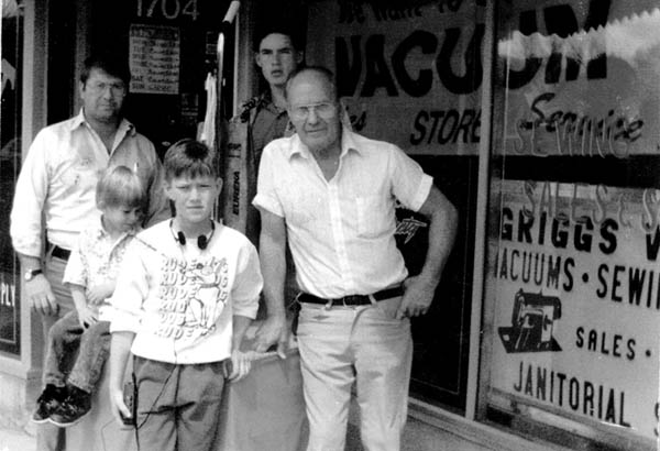 A picture from 17 years ago in front of the Griggs Vacuums storefront at the former location (1704 W. Colorado Ave.) 
shows Paul Griggs (front, right), his son Dwight (far left), and Dwights sons Allen (rear), Aaron (front) and Adam. 
Courtesy of Dwight Griggs