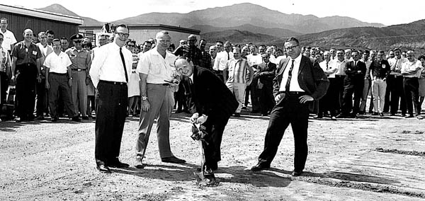 Al Bridges (with shovel) breaks ground for Kaman Sciences
Building 3 in about 1963. Standing with him are (from left) 
co-executives John Hoffman, Phill Jessen and Frank Shelton. Buildings 1 and 2 are at the left rear.
Courtesy of Albert Bridges