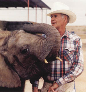 Area rancher Bob Norris is shown with a pet elephant (Amy) he once kept at his ranch.
Norris photo is from the book, The Cowboy and His Elephant, by Malcolm MacPherson