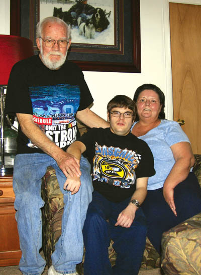 Grant Renck is flanked by his parents, Les and Deb, in a recent photo.
Westside Pioneer photo