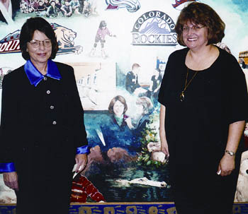 Diana Francese (left) and Kathy Halstead Barnes pose in
front of the Bristol mural during the dedication in January 
2000. Barnes, suffering from incurable breast cancer, died eight months later.