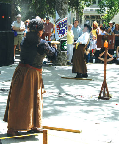 Jackie Matz (foreground) guns down a surprisingly affable
opponent during qualifying rounds of the 2007 Territory Days Fast Draw competition. New last year, the event will return at this years festival.
Westside Pioneer photo