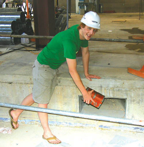 Shh! Its a secret! Coronado High senior Andrew Ives
shows where a nook was created for the time capsule on
one side of the new auditoriums stage.
Westside Pioneer photo