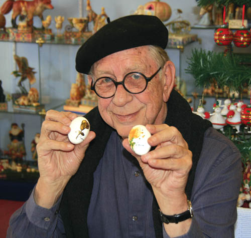 Mr. Eugene displays two of several dozen eggs he painted
during an Eastertime session at the Holly Leaf in Old Colorado City this year.
Westside Pioneer photo