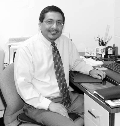 Rick Gallegos sits at his desk at Howbert Elementary School.
Westside Pioneer photo