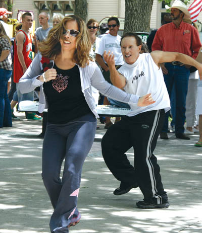 Territory Days scenes in Bancroft Park  Husband-wife team Dorie and Mark Wexler lead a Springs Salsa & Dance 
Fitness performance.
Westside Pioneer photo