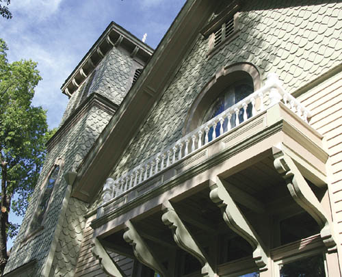 Looking up from 24th Street takes in painting touches on an original balcony and other exterior aspects of the west 
side of the Old Colorado City History Center.
Westside Pioneer photo