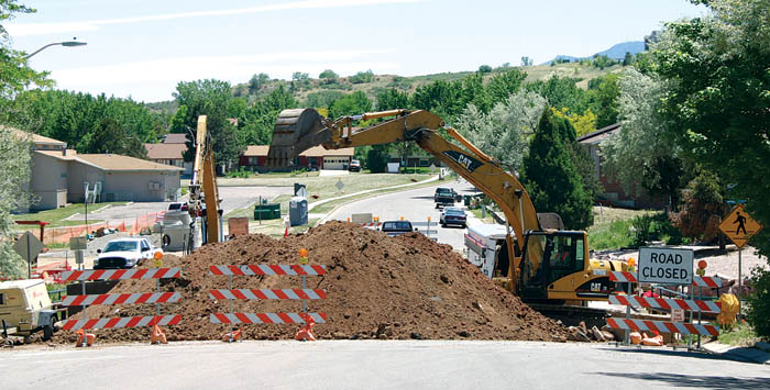 A Colorado Springs Utilities project forced the temporary closure of Holland Park Boulevard at the Douglas Creek 
Trail crossing this week, but the road is scheduled to reopen by this weekend.
Cynthia McGrath photo