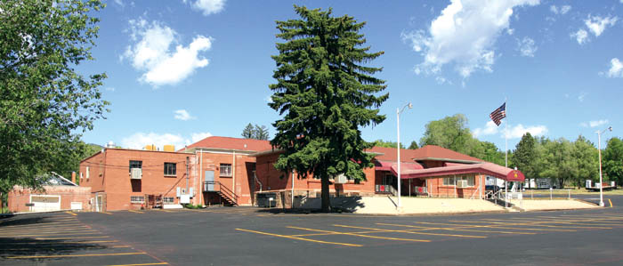 The facility from the same angle this week, including additions during the 60 years of ownership by the Colorado Springs Shrine Club. 
Question: Is that the same tree, nearest the building?
Westside Pioneer photo 
