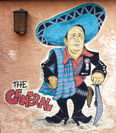 It could not be confirmed for this article, but this small mural outside the rear entrance to Henris may be a depiction of 
restaurant founder Henri Ruiz. Does anybody know for sure?
Westside Pioneer photo