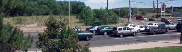 In a photo looking east across 21st Street from the Prospector sculpture, the property at the northeast 
corner of the 21st Street/Highway 24 intersection looks much the same as it has for the past century or more.