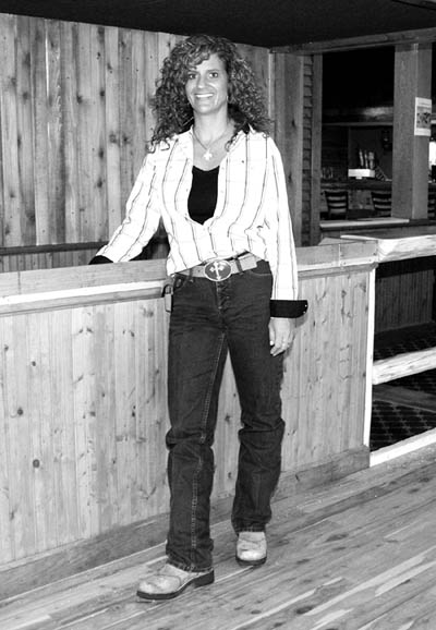 LeShawn Carey enjoys the 750-square-foot hardwood dance floor she had installed for her new Carey-On Saloon.
Westside Pioneer photo