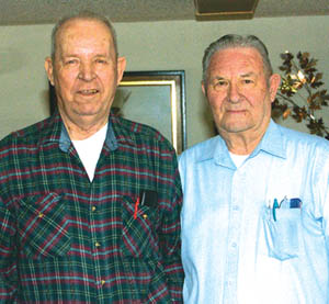 Neil Leuhring (left) and Bob Edgar pose inside Luehrings home.
Westside Pioneer photo