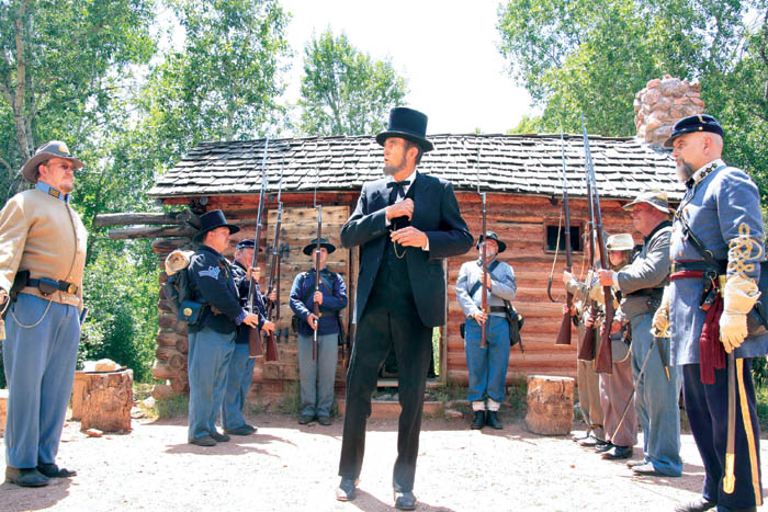 Abraham Lincoln (portrayed by Merell Folsom) delivers the Gettysburg Address at Rock Ledge Ranchs Galloway Cabin 
during its Family Fourth.
Westside Pioneer photo