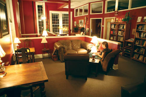 An Agia Sophia patron makes use of the upstairs reading
room in the coffeehouse, which is located in the renovated,
1880-built Colorado City city hall.
Westside Pioneer photo