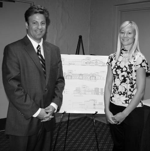 Two of the Pinery leaders at the Aug. 12 neighborhood
meeting  Eric Allen and Dani Silvestro  pose with drawings that show how the planned wedding event center on the Bijou Street Hill would look.
Westside Pioneer photo