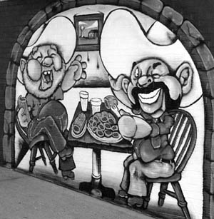 Jolly diners adorn one of the walls in the Texas Tamales mural.