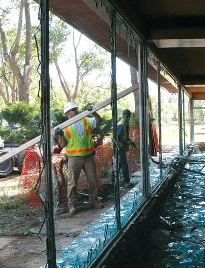 Workers with TR Demolition (subcontracted to Charlie Paterson Construction) knock out the glass in the one-
time picture windows of the former Bock family house in what is now city-owned Red Rock Canyon Open Space.
Westside Pioneer photo