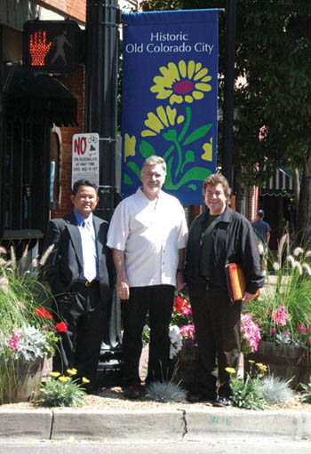 Standing at the northeast corner of 25th Street and Colorado Avenue, Old Colorado City Associates President
Jim Heikes (center) is flanked by Seiko Tran (left) and Tom Beard of the Zeal Group.
Westside Pioneer photo