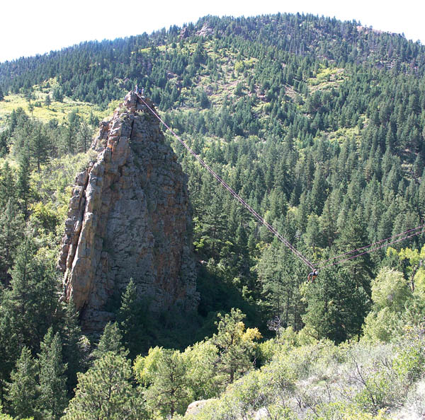Traversing with a carabiner, a competitor readies for a hillside landing during an 
adventure race in Bear Creek Park Sept. 27.
Westside Pioneer photo