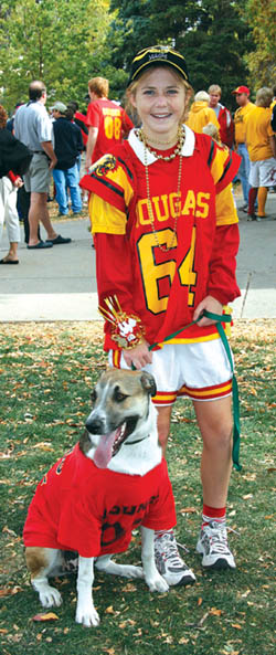 Decked out in school colors are Coronado Student Council member Hannah Green and her dog Sid during 
the pep rally in Bancroft Park.
Westside Pioneer photo