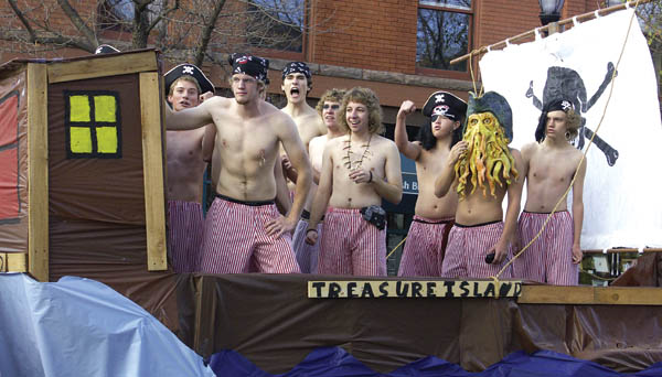 Floats with excitable riders were in abundance at the Coronado High School Homecoming Parade Oct. 7: The boys swim 
team, unfazed by the morning chill, strike fierce poses. 
Westside Pioneer photo