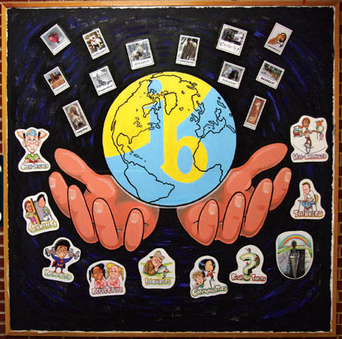 Fred Eyer's globe mural.He drew the globe and hands and created the caricatures for each attitude, while the profiles 
were clipped and positioned at the top.
Westside Pioneer photo